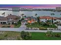 Stunning waterfront estate showcasing amazing water views, lush landscaping and beautiful tile roofs at 5287 61St S Ave, St Petersburg, FL 33715