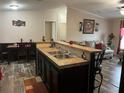 Open kitchen overlooks dining and living areas, great for entertaining and Gathering at 12426 Terra Ceia Ave, New Port Richey, FL 34654
