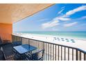 Balcony with beach views and seating to relax by the ocean at 17334 Gulf Blvd # 203, North Redington Beach, FL 33708
