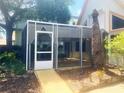 Enclosed screened porch offering a relaxing outdoor space at 20989 Negril, Lutz, FL 33558