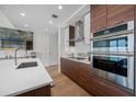 Modern kitchen showcasing sleek countertops, modern stainless steel appliances, and custom cabinets at 301 1St S St # 1906, St Petersburg, FL 33701