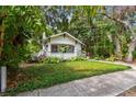 A charming bungalow with lush greenery that enhances curb appeal in a desirable location at 848 9Th S Ave, St Petersburg, FL 33701