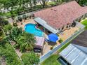 A high angle view of a private pool and backyard at 810 Erik Lake Rd, Brandon, FL 33510