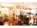 Inviting kitchen with stainless steel appliances, breakfast bar, adjacent to dining and living areas at 810 Erik Lake Rd, Brandon, FL 33510