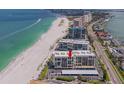 An aerial view shows the condo is located on the beach with beautiful views at 1430 Gulf Blvd # 707, Clearwater Beach, FL 33767
