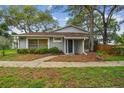 Inviting single-story home with well-maintained landscaping and serene curb appeal at 14732 Morning Dr, Lutz, FL 33559