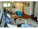 Cozy living room with contemporary decor, stylish furnishings and hardwood floors at 2737 Enterprise E Rd # 192, Clearwater, FL 33759