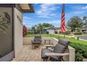 Cozy front porch with cushioned chairs creates an inviting outdoor seating area at 4512 Superior Ln, Clearwater, FL 33762