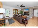 Inviting living room featuring a modern fireplace and comfortable seating at 614 12Th Nw St, Largo, FL 33770