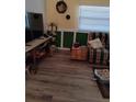 Living room featuring hardwood flooring and bright colors at 7608 Chenkin, Zephyrhills, FL 33540