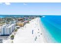 Beautiful coastal condo on a pristine beach with clear turquoise water and scenic surroundings at 13500 Gulf Blvd # 507, Madeira Beach, FL 33708