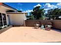 Cozy outdoor patio with seating area, perfect for relaxation at 1373 Fairfax Rd, Clearwater, FL 33764