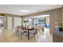 Open-concept living spaces with tiled flooring, neutral walls, and modern furnishings throughout at 821 52Nd S Ave, St Petersburg, FL 33705