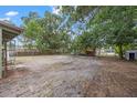 View of the backyard, showcasing the outdoor space and potential for landscaping at 9213 W Robson St, Tampa, FL 33615