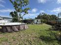 A large backyard space ready to be transformed into your personal paradise at 2524 Novus St, Sarasota, FL 34237