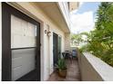 Private patio with table and chairs offers an outdoor space for relaxation and enjoyment at 2943 Bough Ave # C, Clearwater, FL 33760