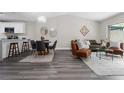 Bright, open floor plan seamlessly blends living, dining, and kitchen, perfect for modern living at 4418 Pine Meadow Ct, Tampa, FL 33624