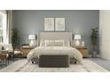 Stylishly decorated main bedroom suite with a comfortable bed, neutral tones, and cozy seating at 4752 Southern Valley Loop, Brooksville, FL 34601