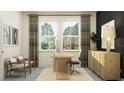 Bright home office featuring modern decor, sleek wooden desk, and comfortable seating at 7519 E 117Th Ln, Palmetto, FL 34221