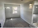 Inviting entryway with new floors, fresh paint, and natural light at 22365 Panorama St, Brooksville, FL 34601
