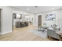 Open-concept living area seamlessly connects the kitchen and dining, perfect for entertaining at 731 38Th N Ave, St Petersburg, FL 33704