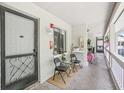 Relaxing condo patio with seating area, perfect for enjoying the outdoors at 20921 Haulover Cv # 8, Lutz, FL 33558