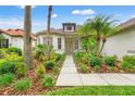 Charming single-story home boasts lush landscaping and an inviting walkway at 2238 Shirecrest Cove Way, Lutz, FL 33558