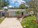 Charming single-story home with a well-maintained lawn and inviting curb appeal at 6941 58Th N Way, Pinellas Park, FL 33781