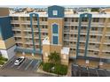 Building view with white railings on the balconies at 960 Starkey Rd # 2103, Largo, FL 33771