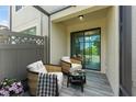 Cozy balcony with comfortable seating, perfect for relaxation and enjoying outdoor views with a cup of coffee at 11526 Crowned Sparrow Ln, Tampa, FL 33626
