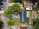Aerial view outlining property boundaries, driveway and roof at 1813 E Wood St, Tampa, FL 33604