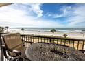Relax on this balcony with stunning ocean views and comfortable outdoor seating at 15000 Gulf Blvd # 407, Madeira Beach, FL 33708