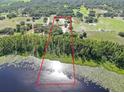 Large lot backing up to a lake and wooded area providing privacy at 17023 Alderman Turner Rd, Wimauma, FL 33598