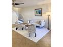 Inviting living room features bright neutral decor and a cozy seating area, perfect for relaxing at 850 S Tamiami Trl # 424, Sarasota, FL 34236