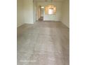 Spacious living room featuring neutral carpeting and ample natural light at 8814 Walnut Gable Ct, Riverview, FL 33578