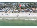 Beachfront property boasting white sand and ocean views, ideal for vacationing and relaxation at 204 Haven Beach Ct, Indian Rocks Beach, FL 33785