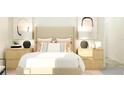 Inviting bedroom with a large headboard, neutral decor, and stylish bedside tables at 32110 Griffin Sands Ln, San Antonio, FL 33576
