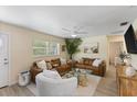 Inviting living room featuring stylish decor, comfortable seating, and a bright, open layout at 4492 Kingston Dr, Hernando Beach, FL 34607
