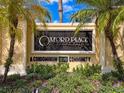 Beautifully landscaped entrance sign for Oxford Place at Tampa Palms, a condominium community at 5125 Palm Springs Blvd # 3108, Tampa, FL 33647