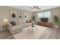 Comfortable living room with neutral tones, a large sectional sofa, and a contemporary entertainment center at 5432 Rainwood Meadows Dr, Apollo Beach, FL 33572