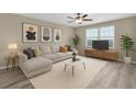Cozy living room featuring a comfortable sectional sofa, contemporary decor, and ample natural light at 5432 Rainwood Meadows Dr, Apollo Beach, FL 33572