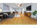 Spacious living room with hardwood floors, modern decor, and plenty of natural light at 19531 Gulf Blvd # 306, Indian Shores, FL 33785