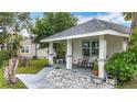 Charming home with a welcoming front porch, complete with rocking chairs for relaxation at 4339 58 N Ave, St Petersburg, FL 33714