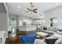 Bright living room offers hardwood floors, recessed lighting, and an open concept layout at 9608 Greenpointe Dr, Tampa, FL 33626
