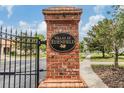 Brick monument with signage for the Villas at Edenfield at 27427 Mistflower Dr, Wesley Chapel, FL 33544