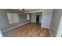 Spacious living room featuring sleek wood floors and an open layout at 2910 15Th Ave S, St Petersburg, FL 33712
