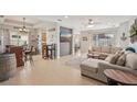 Inviting living space featuring tile floors, stylish decor, and comfortable furnishings at 4020 Cottage Hill Ave, Parrish, FL 34219
