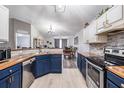 Bright kitchen featuring stainless steel appliances, wood countertops, and attractive backsplash at 5334 Tummel Ct, Wesley Chapel, FL 33545