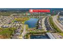 Aerial view of a community with lake and water front living at 9140 Hillcroft Dr, Riverview, FL 33578