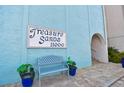 Welcome to Treasure Sands, a charming beachside community with serene sitting areas and lush landscaping at 11000 Gulf Blvd # 703, Treasure Island, FL 33706